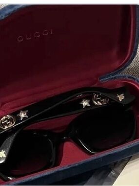 Gucci Black Sunglasses with Gold Logo & Star Accents